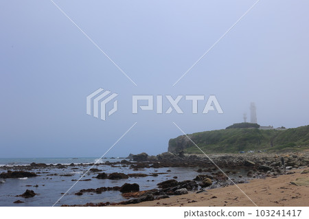 Inubosaki lighthouse and coast covered in fog 103241417