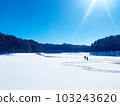 Snowshoe trekking in the snowfield 103243620