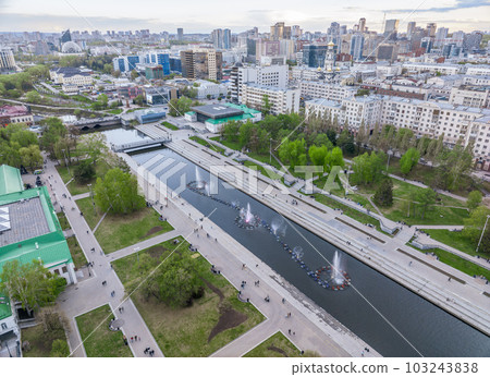 Embankment of the central pond and musical fountain. The historic center of the city of Yekaterinburg, Russia, Aerial View Embankment of the central pond and musical fountain. The historic center of the city of Yekaterinburg, Russia, Aerial View 103243838
