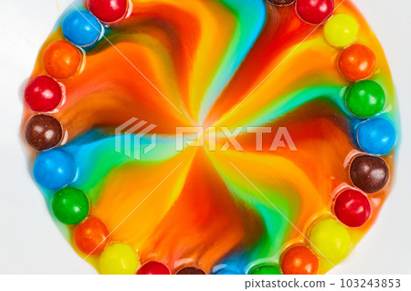 Star burst of color from candy with tie dye center 103243853