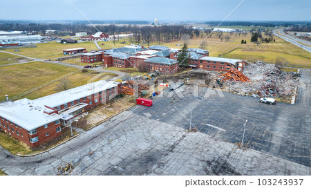 Drone aerial of construction site of deconstruction of old abandoned hospital building with decay at Byron Health Center Drone aerial of construction site of deconstruction of old abandoned hospital building with decay at Byron Health Center 103243937
