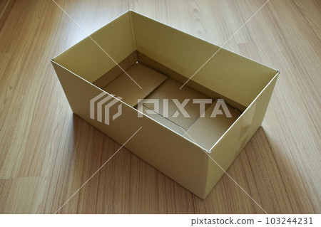 brown post box packaging put on wood floor brown post box packaging put on wood floor 103244231