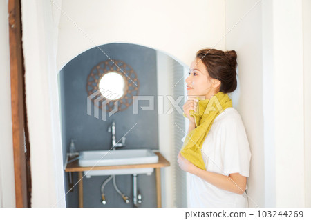 Photo of a woman getting dressed in the morning 103244269