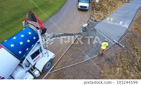 Construction cement truck driveway pour residential home area aerial asset Construction cement truck driveway pour residential home area aerial asset 103244599