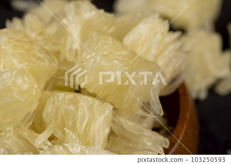peeled and divided into small pieces ripe pale yellow pomelo peeled and divided into small pieces ripe pale yellow pomelo 103250593