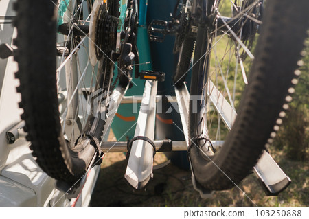 Bicycles are mounted on the motorhome. The concept of travel Bicycles are mounted on the motorhome. The concept of travel 103250888