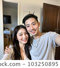 AI generated beautiful man, happy couple taking a picture together 103250895