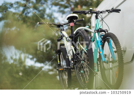 Bicycles are mounted on the motorhome. The concept of travel Bicycles are mounted on the motorhome. The concept of travel 103250919