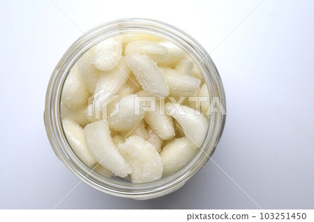 Salted shallots in a glass jar, pickled shallots 103251450