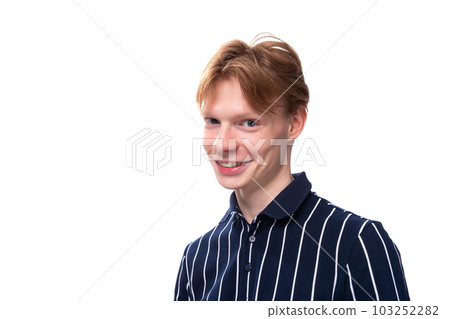 handsome young blond man in blue polo with short haircut handsome young blond man in blue polo with short haircut 103252282