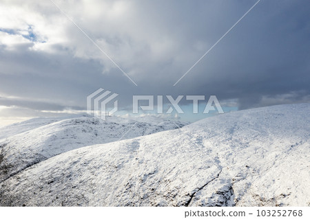 The snow covered Glenveagh Mountains and Glen in County Donegal - Republic of Ireland 103252768