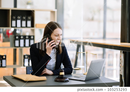 Woman lawyer working and gavel, tablet, laptop in front, Advice justice and law concept.. 103253293