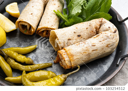 Doner kebab wrap in lavash bread 103254512