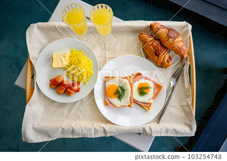 Breakfast, in hotel sunny side up fried eggs Breakfast, in hotel sunny side up fried eggs 103254748