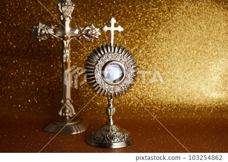 Ostensory for worship for Catholic church ceremony. Corpus christi. 103254862