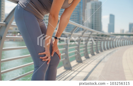 City Running - asian woman runner , Dubai marina urban City Running - asian woman runner , Dubai marina urban 103256315