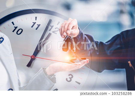 people giving car to hand overlay with time clock for times to repair service a car replace schedule people giving car to hand overlay with time clock for times to repair service a car replace schedule 103258286