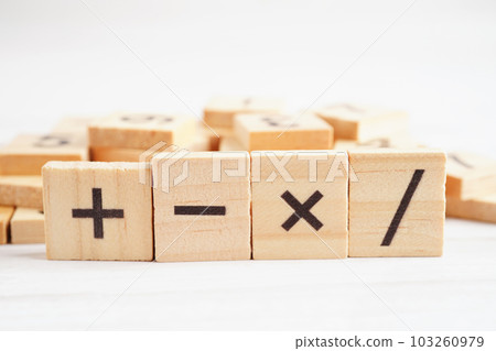 Number wood block cubes for learning Mathematic, education math concept. 103260979