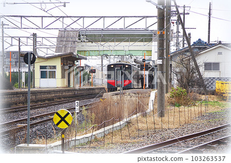 A local train arriving at a quiet local station (illustration style) A local train arriving at a quiet local station (illustration style) 103263537