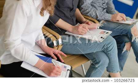 Expatriate people applying for american visa with dollar money and passports closeup 103266725