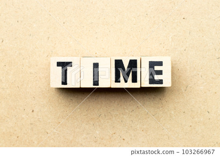 Alphabet letter block in word time on wood background 103266967