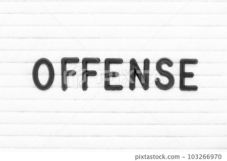 Black color letter in word offense on white felt board background 103266970