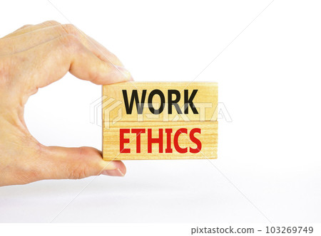 Work ethics symbol. Concept words Work ethics on beautiful wooden block. Beautiful white table white background. Businessman hand. Business and Work ethics concept. Copy space. Work ethics symbol. Concept words Work ethics on beautiful wooden block. Beautiful white table white background. Businessman hand. Business and Work ethics concept. Copy space. 103269749