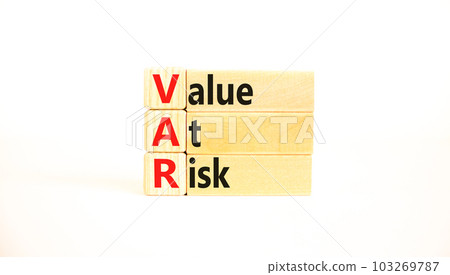 VAR Value at risk symbol. Concept words VAR Value at risk on beautiful wooden block. Beautiful white table white background. Business and VAR Value at risk concept. Copy space. 103269787