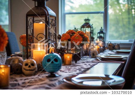 Halloween table setting with pumpkins and skulls Halloween table setting with pumpkins and skulls 103270010