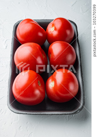 Fresh red organic tomatoe, on white background Fresh red organic tomatoe, on white background 103270399