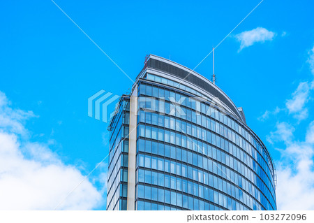 Glass Tower with a Stunning Blue Facade 103272096