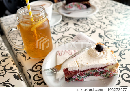 Maltese cafe cake and iced tea Maltese cafe cake and iced tea 103272977
