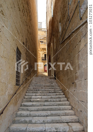 Back alley with long stairs in Malta Back alley with long stairs in Malta 103273031