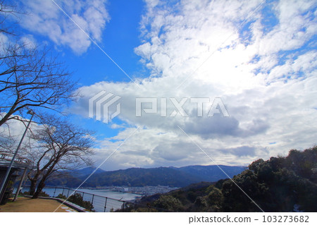 big white clouds in the wide sky 103273682