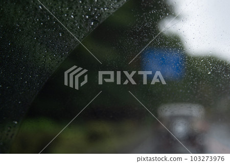 Scenery drive from inside the car on a rainy day 103273976