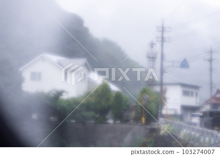 Scenery drive from inside the car on a rainy day Scenery drive from inside the car on a rainy day 103274007