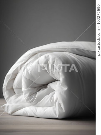 Folded Soft White Fluffy and Thick Duvet against White Background Interior. Generative ai Folded Soft White Fluffy and Thick Duvet against White Background Interior. Generative ai 103275690