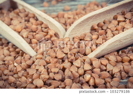 Heap of buckwheat containing vitamins and dietary fiber. Healthy nutrition 103279186