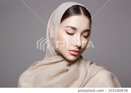 beautiful islamic young woman with Make-up. beauty girl in hijab beautiful islamic young woman with Make-up. beauty girl in hijab 103280636
