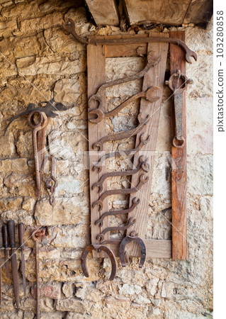 Old set of blacksmith tools 103280858