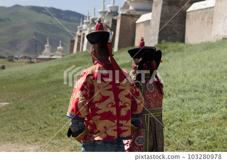 Couple in traditional clothes in front of Erdene Zuu Monastery Couple in traditional clothes in front of Erdene Zuu Monastery 103280978