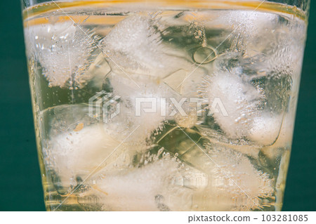Ice liquid in the glass. Ice cube Ice liquid in the glass. Ice cube 103281085