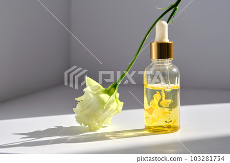 Serum with yellow petals and a delicate flower. Serum with yellow petals and a delicate flower. 103281754