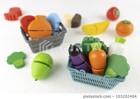 Shopping basket and toy food. shopping image Shopping basket and toy food. shopping image 103282484
