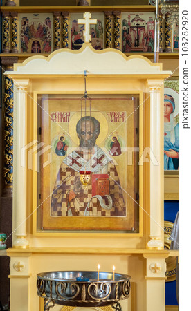 SHYMKENT, KAZAKHSTAN - JANUARY 24, 2023: ancient icon of Nicholas the Wonderworker in the Church of Our Lady of Kazan 103282920