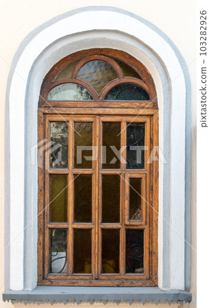 SHYMKENT, KAZAKHSTAN - JANUARY 24, 2023: historical wooden window in the Church of Our Lady of Kazan 103282926