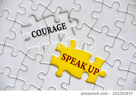 Courage to speak up text on missing jigsaw puzzle representing business culture in exercising speak up 103283837