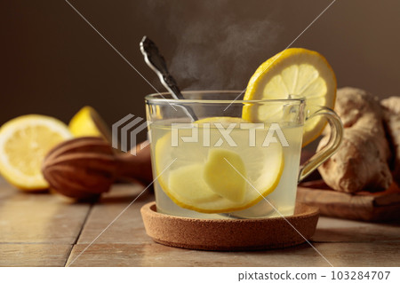 Ginger tea with lemon. 103284707