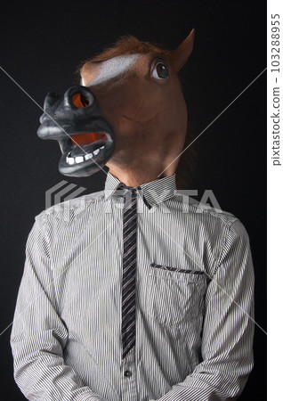 Person wearing a shirt wearing a horse mask / Sorry, embarrassed, sorry (black background) Person wearing a shirt wearing a horse mask / Sorry, embarrassed, sorry (black background) 103288955