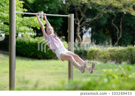 Girls playing with iron bars 103289433